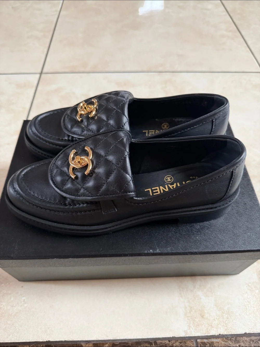 CHANEL Black Quilted Leather Loafers with Gold CC Hardware